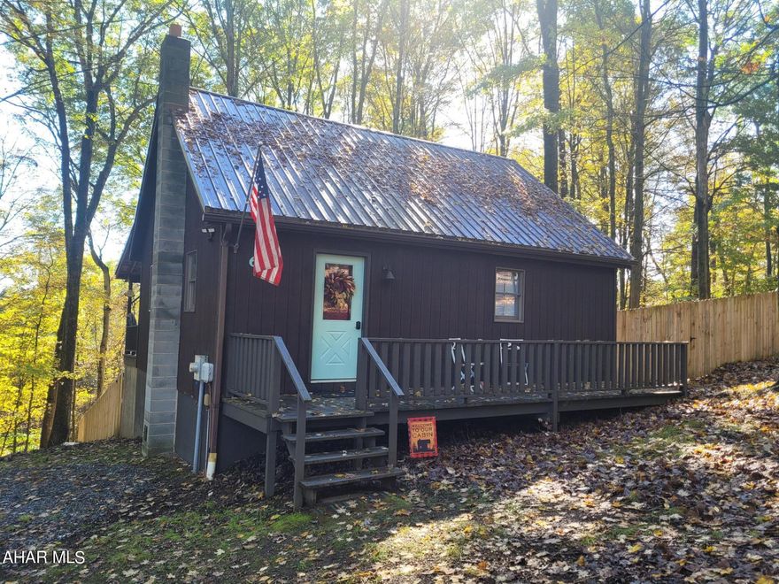 Adorable cabin is ready to become your private getaway.  The large great room sports a cathedral ceiling and an electric fireplace to add to the cabin feel.  Two sleep areas and a full bath take care of the necessities so you can focus on what you come to the woods for - relaxing and watching the wildlife around you.  Sit on the back porch and keep your eyes on nature and your children and / or pets in the divided fenced in area.  
Enjoy the amenities of Glendale Yearound:  club house, swimming pool, tennis/basketball/volleyball courts, playgrounds, dog park, etc. or heat over to Prince Gallitzin State Park / Glendale Lake for boating, hiking, or taking a picnic lunch.  State Game lands 108 are right down the road and Rock Run ATV park is six miles away.