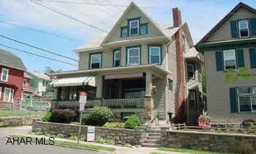 BEAUTIFUL, BEAUTIFUL, BEAUTIFUL INSIDE..... REDUCED! UPDATED EARLY AMERICAN STUNNER! 3-4 BR, WITH EXCELLENT OAK WOODWORK, FP IN LR, POCKET DOORS, LOW YARD MAINTENANCE AND OFF STREET PARKING. MINUTES FROM THE ALTOONA CAMPUS.  YOU MUST LOOK INSIDE THIS BEAUTY.  LOW TAXES.  DON'T LET THE (CLEAN) CATS OUT!!   MIKE MANGIA  946-4343 X121, 941-3997.