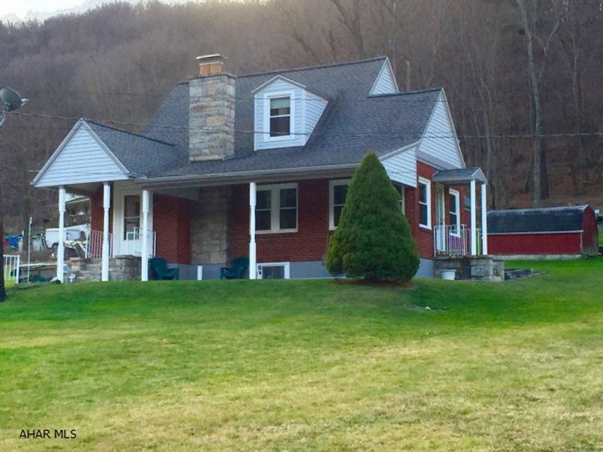 If you are looking for a move-in ready home in a desirable area near Raystown lake, then look no further. This home has many upgrades including new roof, new windows, new siding, new custom kitchen and new carpeting. A fabulous heated sunroom plus large first floor master bedroom and bath add great convenience. Take note of the room sizes as they are wonderfully spacious throughout. No need to worry about storage as this home has tons. The heating systems have also been upgraded with newer oil furnace and also wood/coal furnace. Backing onto the woods and a home that has been meticulously maintained make this a must see home!