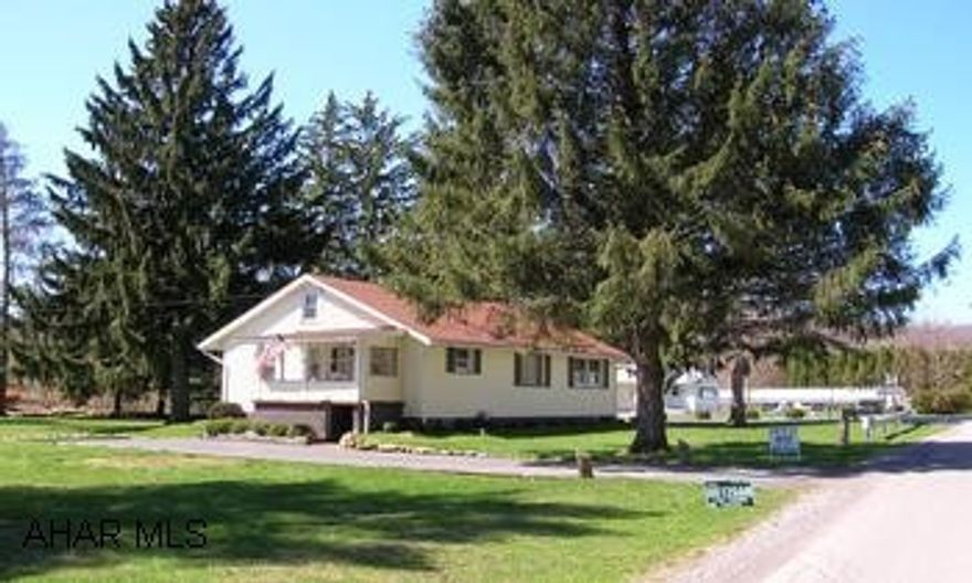 Vinyl sided 1 1/2 story on large lot and private setting. 2 bedrooms, many extras and much more!