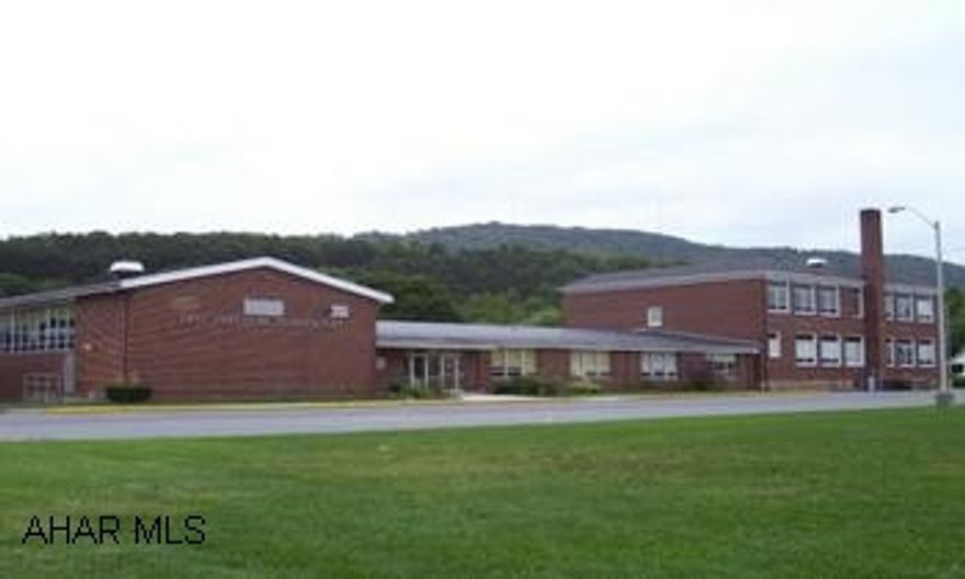 Approximate 20,000 square foot brick building in good condition. Former East Freeom Elementary School. 4.0 acres along Old Route 220. Approximately 20,000 square foot brick building in good condition. Former East Freedom Elementary School. 4.0 acres along Old Route 220.