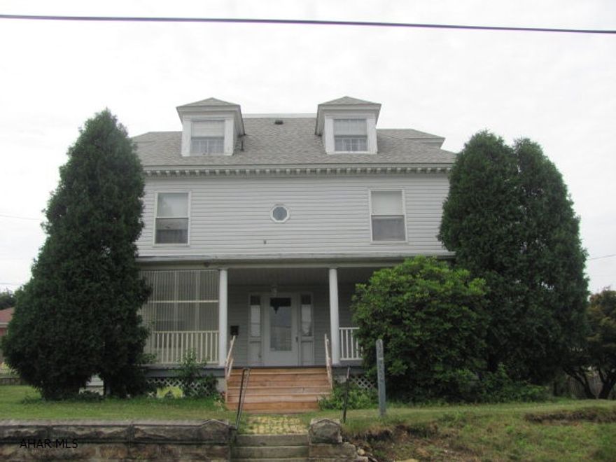 Large home in Patton Borough with newer windows, roof and siding. Property could be a single family residence or a 3 unit rental with separate electric and laundry hook ups.