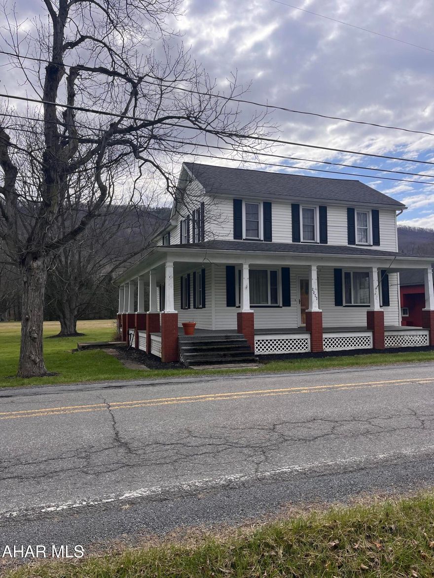 This will kept home is warm & inviting with its wrap around porch & offers updates throughout.  Modern Kitchen & Baths nice bright rooms w/lots of natural light.
Windows roof & siding have all been done.
Hot water heat makes it a great way to warm up in winter. 
The barn and the acreage make this a great place if you want to raise chickens & gots or just enjoy space for your hobbies/toys.