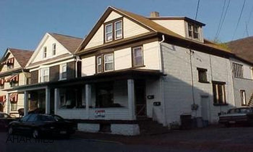 Newer roof ,one new furnance, security light, new hot water tanks, newer kit on 2nd floor.  Good investment.  Separate utilities. Newer roof ,one new furnance, security light, new hot water tanks, newer kit on 2nd floor.  Good investment.  Separate utilities.