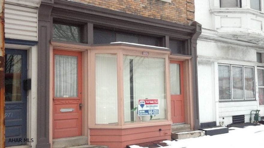 Large building - would make great up & down duplex, or an office or maybe a store front not needing much parking space. Dated but in good condition. Great Price!