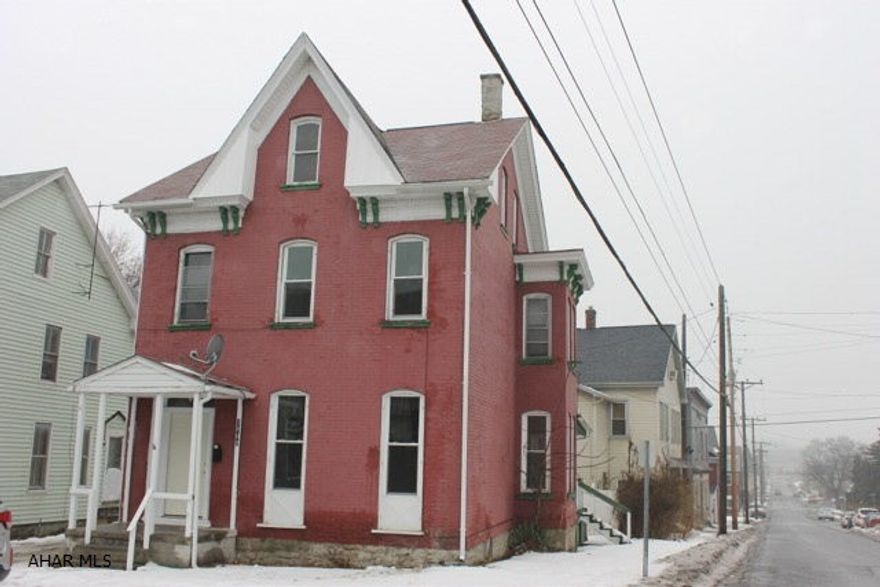 Charming and spacious brick home. Large eat-in kitchen, laundry, bonus room and full bath on main floor. Beautiful staircase to 2nd floor with 3 bedrooms, bonus room and full bath. New mechanics and off street parking.