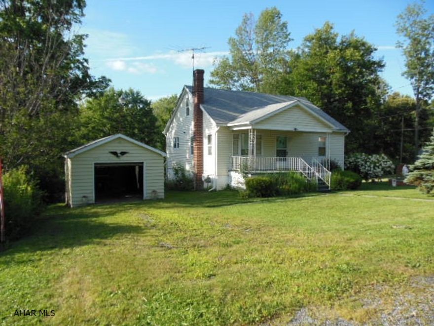 REDUCED!! Logan Township Cape Cod on a nice lot with a private back yard! 3-4 BR (1 nursery size) baths on each level, 1 car detached garage with room to expand house or garage. Newer GFA furnace covers basement and original GFA furnace for rest of home. Needs cosmetics, needs to be hooked up to public (Logan Twp.) sewer, older electric panel, but functioning. Well worth the needed things being done. A wonderful quiet setting just off of Rt. 220!  Reasonable offer considered!!