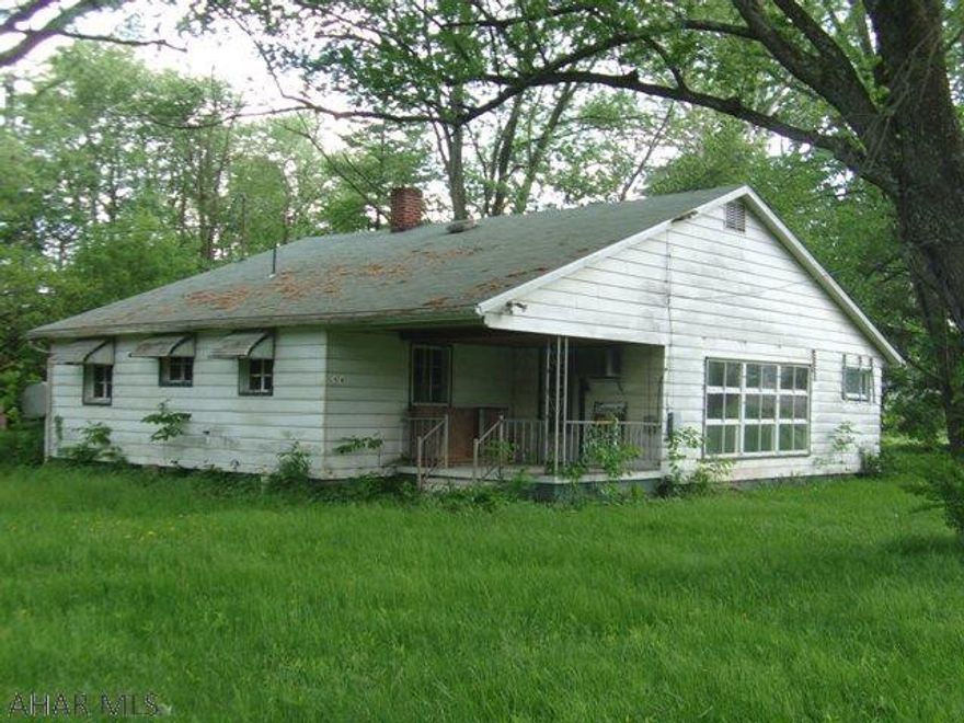 1.25 Acres on the river.  Needs some TLC, but this 2 bedrm cottage with new roof is the perfect place to unwind.  The fireplace keeps the chill away on cool evenings and the open concept makes it easy to heat or cool.  Great space and flow for entertaining.  With over an acre, there's lots of room to expand and add on.  Fishing and kayaking out your back door.  Large yard is perfect for  friends, grilling and games.  What a great getaway!