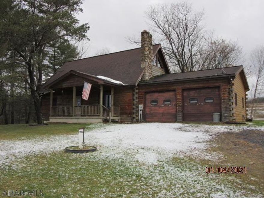 Great location- log cabin with main floor master bedroom, lots of potential, please note that the garage, well and driveway are on tax id 8-22-10.1 and need to be purchased separately, survey map is under documents