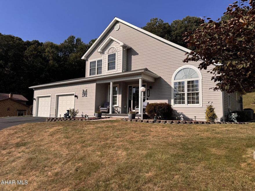 Immaculate 3 bedroom, 2 1/2 bath home with vaulted living room ceiling with propane fireplace, four season room with propane fireplace, first floor bedroom/office, spacious kitchen with pantry & bar area.  first floor laundry.  2 Car Attached Garage, private rear deck with above ground pool.  Large Shed.  Appliances included.  All on 6/10 acre lot.