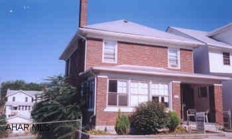 CHARMING 2 STORY BRICK ON A FULLY FENCED DOUBLE LOT. 3 BEDROOM, 1 BATH, 3/4 BATH IN BASEMENT. 1 CAR DETACHED GARAGE. COZY CHERRY KITCHEN.