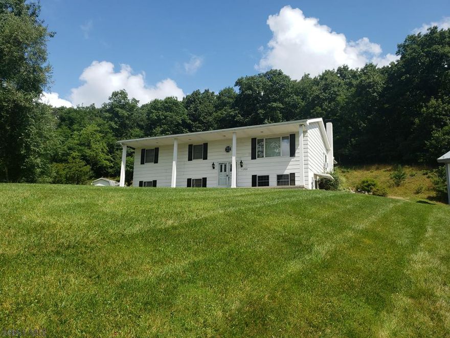 See 3D tour coming soon!  Looking for some seclusion and privacy but want to be close to everything, then check out this well maintained, 3 bedroom property situated on 1.59 acres in the Fairview section of Altoona. Features include a large county kitchen, 3 seasons room, finished basement with brick gas fireplace, 3/4 bathroom, office, mudroom, and laundry room.  Additionally, this property includes a 995 sq foot pole barn that will be perfect for the mechanic or car enthusiast, or just simply for extra storage and parking. This spacious property is perfect for entertaining or for your next large gathering.  Within minutes of Penn State Altoona, shopping, restaurants, as well as medical care and services, this home won't last.  Call listing agent today for your private tour!