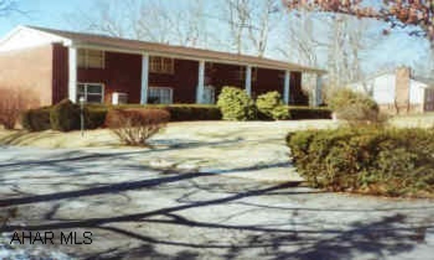 Brick front w. Porch pillars