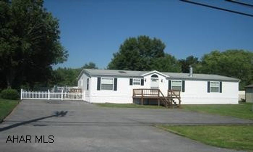 2000 Fleetwood Doublewide on beautiful 3.5 acre lot. Home features eat-in kitchen, fireplace in Living room and large master bath w/ Jacuzzi tub.