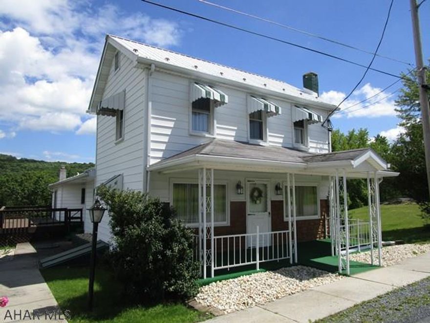 Charming two story home with many updates.  First level includes a living room, kitchen, full bath, laundry room, large master bedroom with access to the deck and master bath. Second level offers two bedrooms and there is a walk-up attic for storage.  This home has been well maintained, offers a two-car detached garage and large lot.  Oil forced air heat, 200-amp electric, private well and public sewer.  This is a very nice home for the price!!!