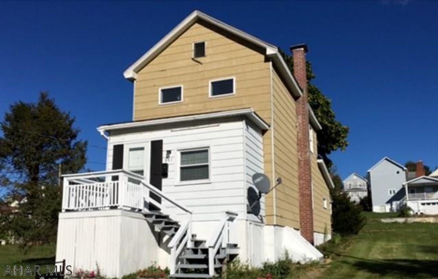 2 Story aluminum  sided 2 BR home. The interior has been freshly painted & new carpet throughout. Gas HW  baseboard heat. Nice 50 x 125 lot.