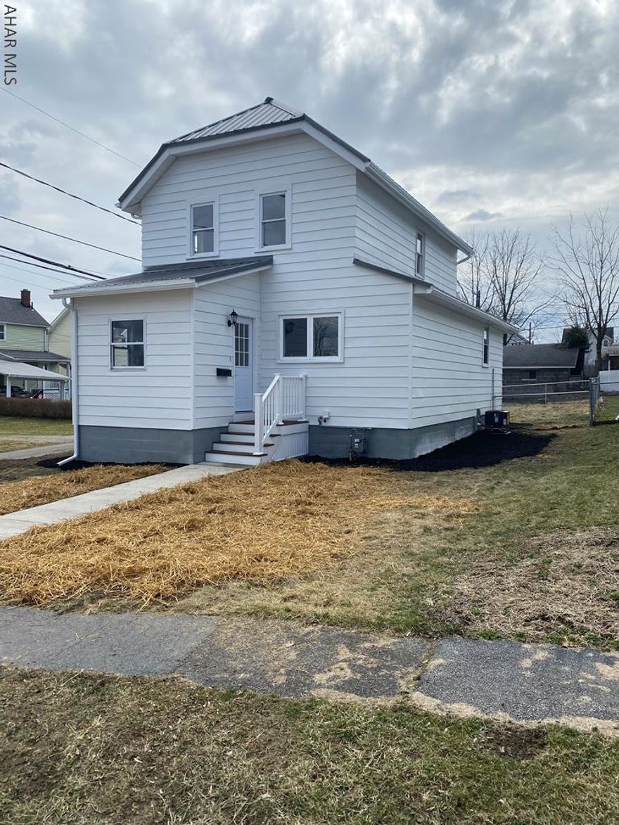 Just move into this Cute as a button.....updated 2 bedroom 1 bath with a fenced yard and off street parking. Vinyl plank flooring and fresh paint throughout. Furnace, metal roof & hot water tank 2019. New front sidewalk & central air installed in 3/2022. Quiet neighborhood. Don't miss this one! Call me today for your personal tour.