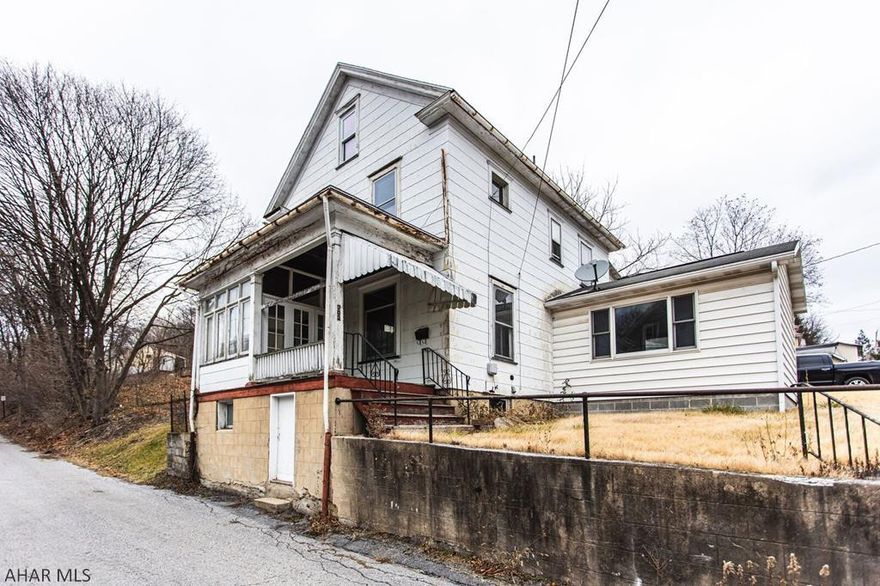 4 bedroom 1.5 bath house with beautiful hardwood floors, new carpet, newer paint and off-street parking.