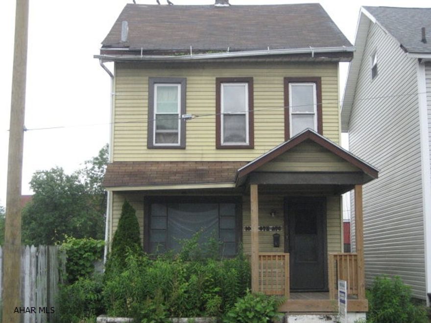 FIXER UPPER NEEDS WORK GREAT FOR THE HANDYMAN. GOOD ROOF, REPLACEMENT WINDOWS OFF STREET PARKING