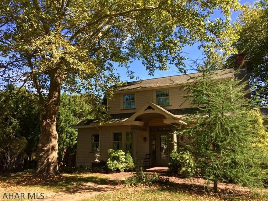 Beautifully renovated Dutch colonial on 1.5 private acres. Many updates include new siding, new flooring, new ceilings, new kitchen, new bathrooms, new guest house and so much more. Designer inspired kitchen with granite counters is sure to impress. The central foyer is graced by French doors and a lovely staircase. A wet bar adds a unique feature to the newly renovated main floor family room. The sunroom is surrounded by walls of glass and look out onto the covered porch and flagstone patio w/fireplace and fish pond. Mountain views, fenced backyard, in ground pool, furnished renovated log house that must be seen to appreciate. Stone pillared entry and you have an impressive home.