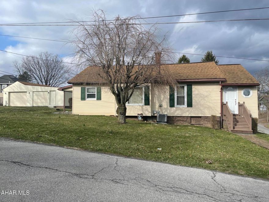 This well maintained ranch home offers 3 bedrooms and 2 bathrooms on a generous double lot.  Featuring a cozy eat-in kitchen, a newer water tank, furnace and central air, this home is move in ready.  The full basement includes a wood-burning stove, perfect for added warmth and ambiance.  A detached two-car garage provides ample storage & parking, the paved driveway has also recently been sealed.