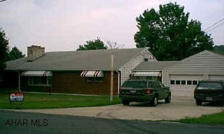 2 Separate lots - 100x150 each - enclosed & heated breezeway.  Large Home.