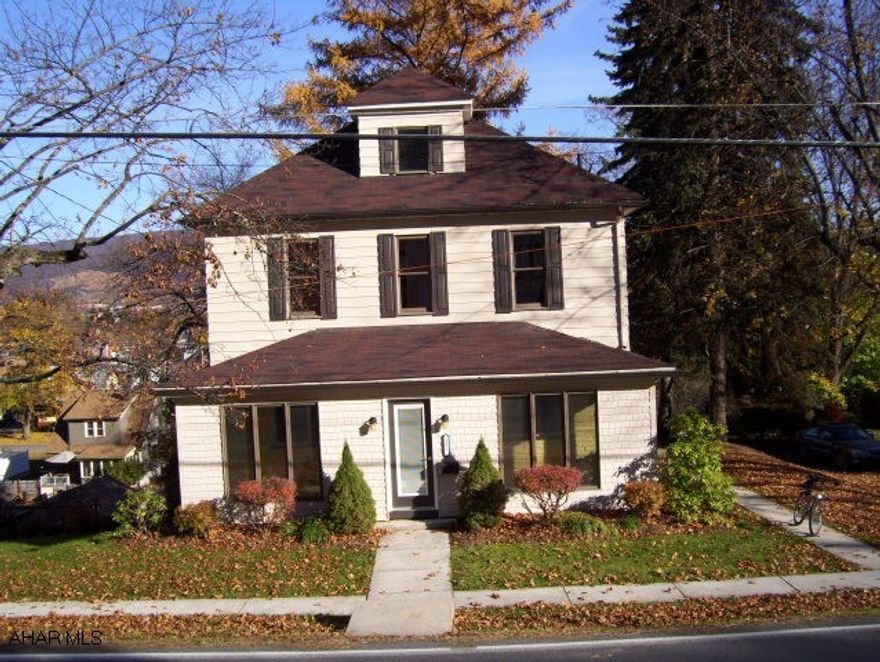 Remodeled & Gorgeous!  This 3-4 bedroom, 2 bath home had a fantastic makeover.  Beautiful new hardwood cherry floors, ceramic kitchen & bath, crown molding throughout. 2 spacious living rooms and dining room. Finished, heated attic could be 4th bedroom, semi finished basement. Screened porch with skylight and also a sun porch. Alot of charm & charisma.  Baker school area.