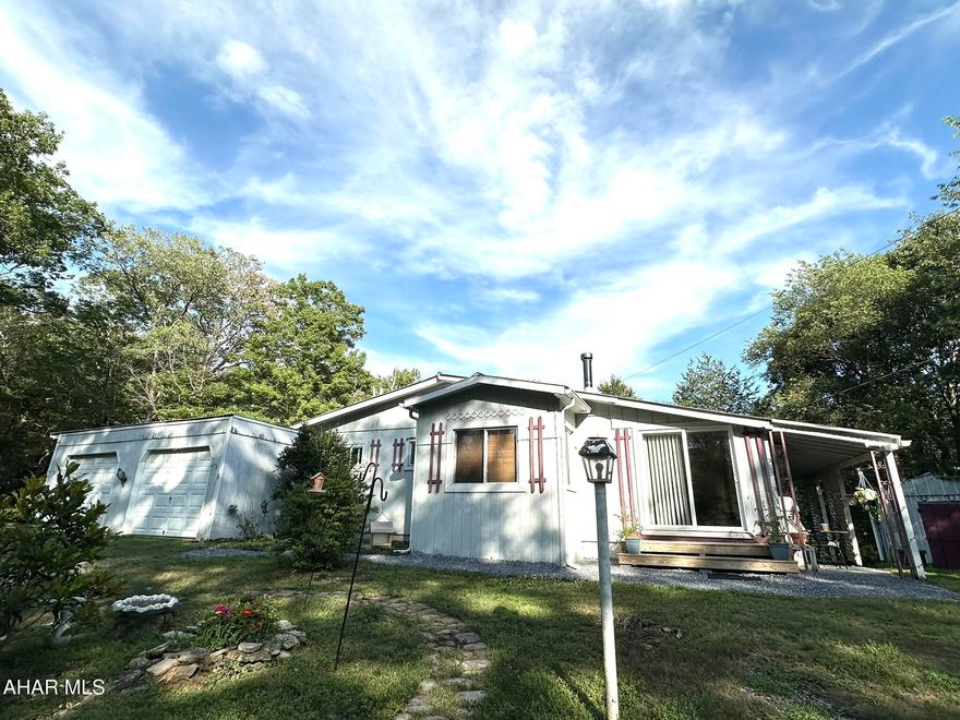 Peaceful Country Living on Nearly 5 Acres. A Hidden Gem!

**The sellers are VERY motivated and will consider all fair offers.

Escape to your own private retreat with this charming home nestled on almost 5 acres in a stunning, secluded rural setting. Surrounded by nature, this property offers the perfect blend of tranquility and space. This home is ideal for those seeking a quiet lifestyle, homesteading, or just room to breathe.

This cozy home features 2 bedrooms, 1 full bathroom, and a huge sunroom that invites natural light and scenic views year-round. Warm up in winter with two wood stoves - one in the living area and another in the bonus room - adding both charm and efficient heating.

Need extra space? The bonus room offers endless possibilities - home office, gym area, expansive mud-room or craft space. Outside, you'll find a two-car garage, shed, fire-pit area and deck overlooking your enchanting canopy of greenery.

Whether you're enjoying a cup of coffee while watching the sunrise over your acreage or stargazing in the quiet evenings, this property is a rare opportunity to live the peaceful rural lifestyle you've been dreaming of.