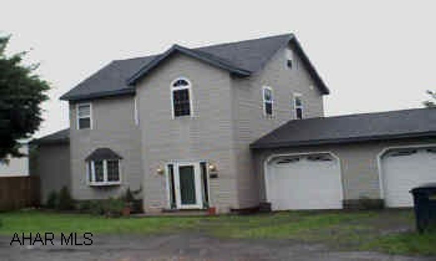 3 story vinyl. Large house, completely remodeled, new well in 2002.