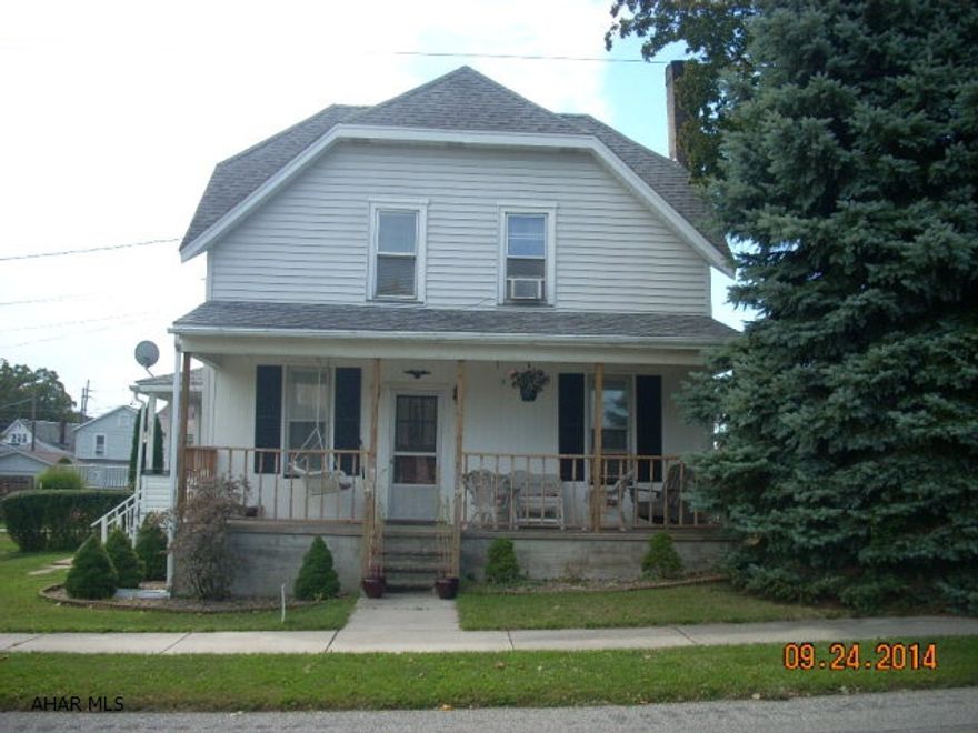 Cozy 3 bedroom home with new bath in quiet neighborhood in popular Bellwood.  Large covered front porch, detached garage.  Newer roof and siding, new hot water tank, new updated electric panel.