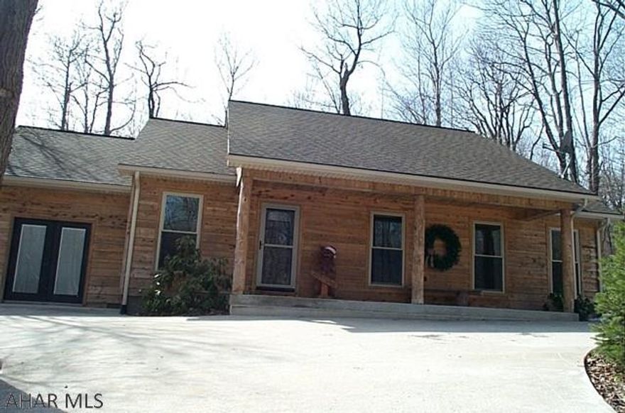 Multi season retreat with 3 bedrooms, 2 baths of resort quality. Elegant natural woodwork and solid hardwood floors throughout. minutes from Blue Knob Resort. Designed for leisure and entertainment. Celebrate nature in this mountain retreat.