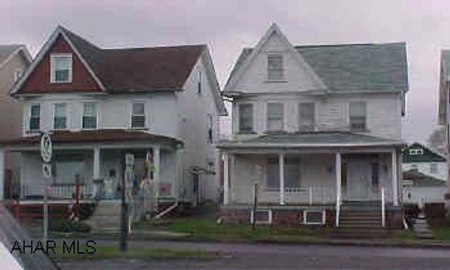 2 1/2 story duplex that could easily be converted back into a single family house.  Front will be painted.  New roof-newer 100 amp electic service.  Newer carpeting in first floor apartment.  Owner looking for offers.