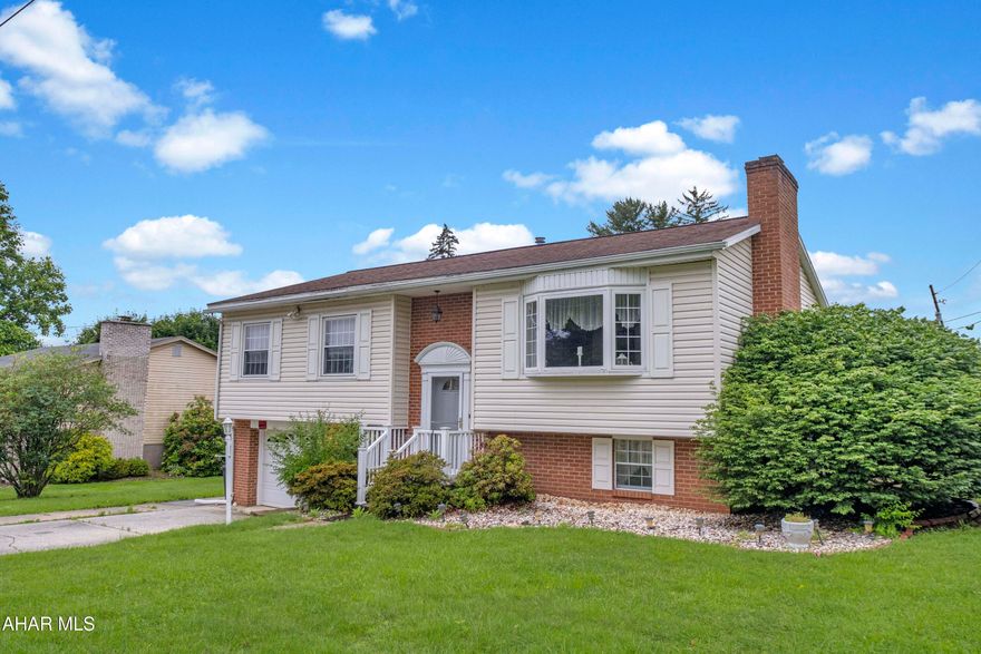 Welcome to 3339 Sylvan Heights Drive in Hollidaysburg — a spacious split-level home situated on a 0.23-acre corner lot in the desirable Sylvan Heights neighborhood. This 3-bedroom, 2.5-bath home offers over 2,100 square feet of finished space, including a lower-level family room complete with a bar and half bath, perfect for entertaining. The main level features large windows that fill the home with natural light, a formal dining room, and a bright kitchen that opens to a cozy 3-season room. The primary bedroom includes a private en-suite bath. Enjoy outdoor living with a patio, deck, and additional storage sheds. An integral garage adds convenience to this well-maintained property. Check out our Matterport 3D virtual tour and schedule a showing today.