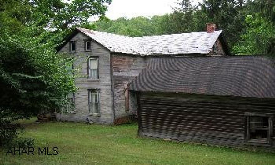 Scenic and secluded!  Old farmhouse and bank barn on 64 +/- acres being sold "AS IS".  Great  hunting and recreational land.  Scenic and secluded!  Old farmhouse and bank barn on 64 +/- acres.  Excellent for hunting or recreational use. Sold "As Is"