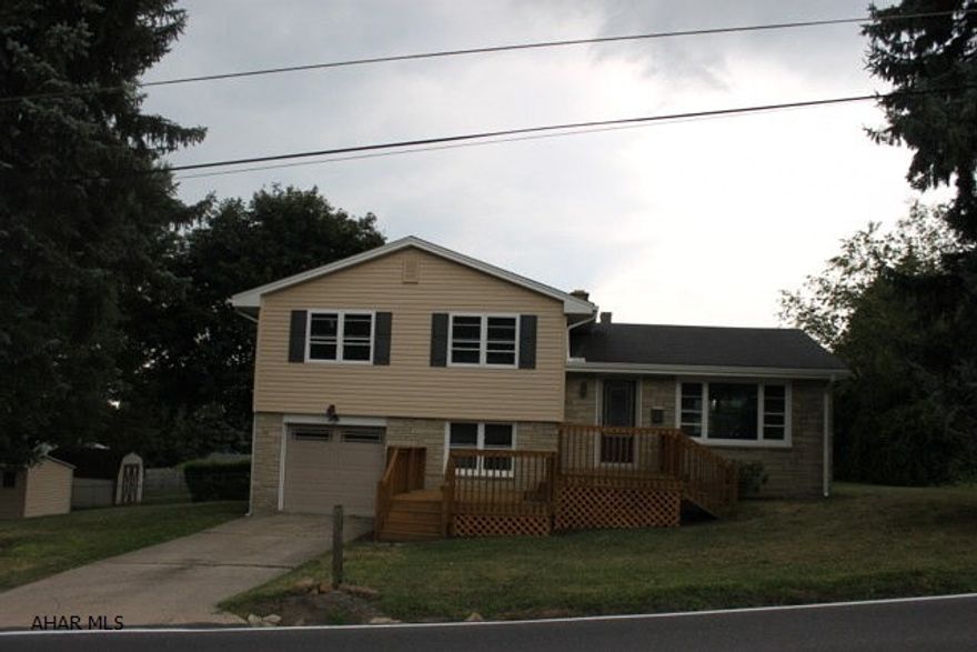 Beautifully remodeled 3 bedroom, 1 1/2 bath, multi-level in great area! Very large lot with partially fenced in area. Hardwood floors throughout 1st and 2nd floors. Family room in lower level.