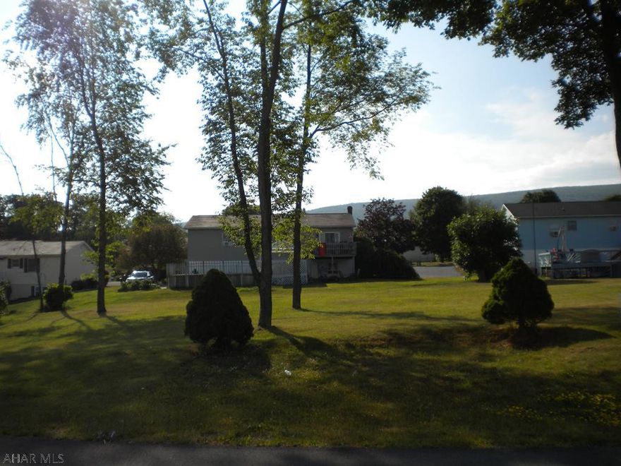 Flat lot in Logan Township. 103x98. Buyer to have well dug. Buyer to have sewer hooked up.