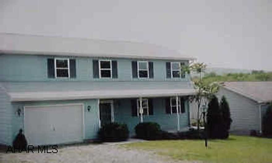 2 story blue vinyl sided, corner property Commision is 2.70 after referral fee