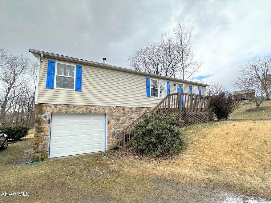 Well maintained double-wide home resting a full foundation. Main level offers a living room, kitchen with eat-in area, owner's suite bedroom with walk-in closet and full bath, two additional bedrooms and a full bath. Full basement that is partially finished with a rec room and pellet stove. One-car integral garage, 200-ampere electric, and oil FA heat. Large yard and front and rear decks. Great location close to schools and all supporting amenities.