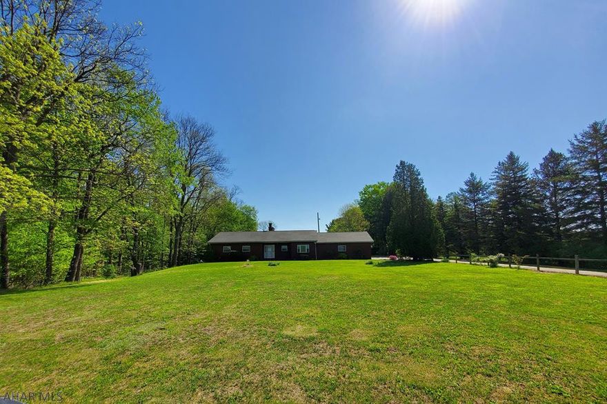 .A new Shingled Roof installed 3/2/2020!!  CertainTeed Limited lifetime warranty & 10 year labor guarantee, transferable to new owner!!!!!! Spacious 3 bedroom 2.5 bath ranch located in a rural area with breathtaking views!!! The 1st floor features a gorgeous fireplace in the living room with a large window allowing plenty of natural sunlight in.  The kitchen has a nice open concept to the dining area where you can open the curtains and watch the beautiful sunsets. Before you enter the house, there is a covered patio that would make an ideal spot for entertaining!!!  The garage is an over sized 2 car garage that is spotless with a workshop and half bath!!! The basement is enormous with an abundance of storage!! This house truly is a MUST SEE!!!