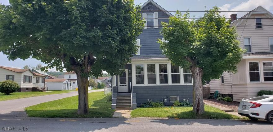 2 story home with 3 bedrooms and 2 bathrooms for sale in Portage. This home has a newer roof(only 3 years old) and newer windows. Updated plumbing, wiring, and electric panel. New paint and carpet and remodeled bathrooms. Fenced in yard with a garage. Walk up attic is great for storage but could be finished for more living space. Washer and dryer are in basement but there are hookups on the first floor.