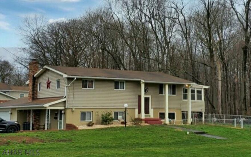 Beautiful 3-4 bedroom home located in a gorgeous, quiet, and highly desirable neighborhood. This bilevel features a screened in porch, 2 car attached garage,  newer furnace and central AC!!!  It's on a large flat lot that will be amazing for outdoor entertaining and has additional off street parking!  Schedule your showing today! (prequalified buyers only) Buyer to confirm taxes, sq footage and lot size