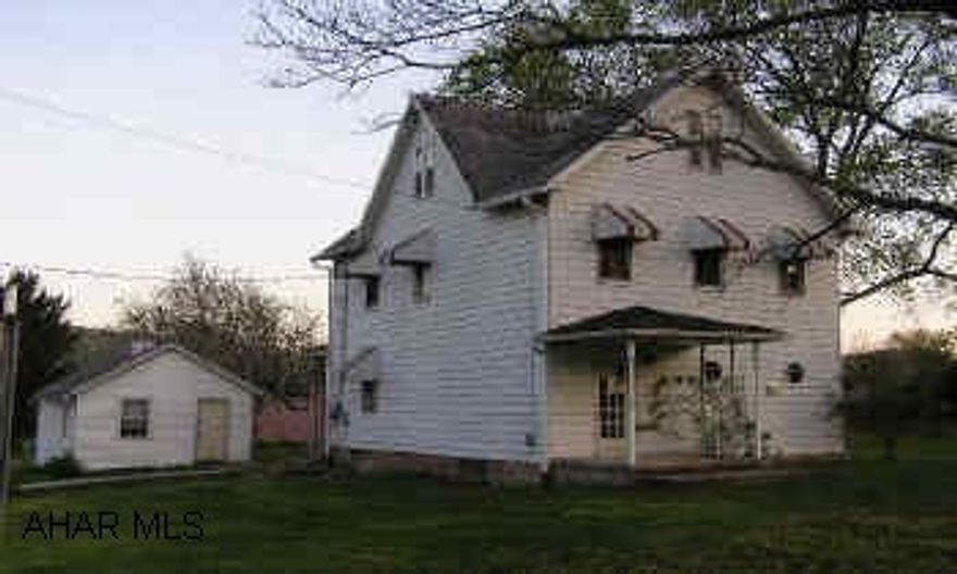 Maintained 2-story frame/aluminum 3BR/2BA on corner lot. Full unfinished basement and 1-car garage / storage bldg.