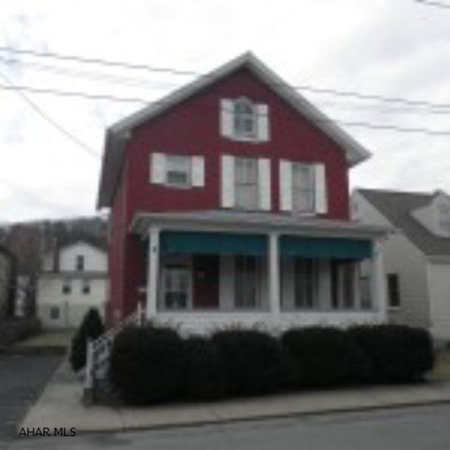 Very Convenient location! Brick 2 1/2 story. 1st and 2nd story porches, Oak kitchen cabinetry, 3rd floor- 4th Bedroom. 2 spot paved on site parking. Nice backyard.