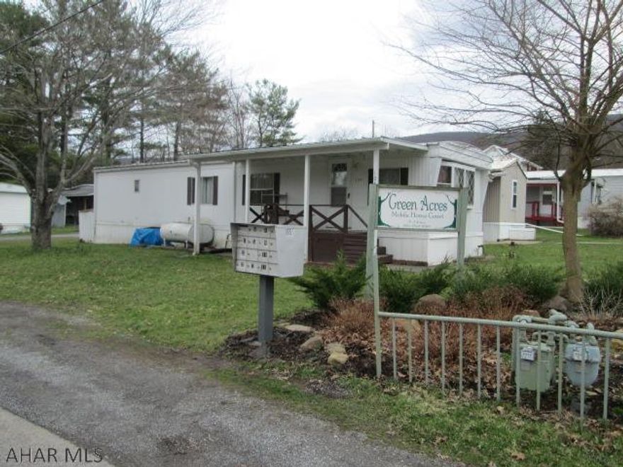 Investors delight!  This Logan Township parcel has one brick 2 story house and includes the exclusive Green Acres Mobile Home Park.  The mobile home park has 10 rental opportunities.  The sale will convey one house, 8 mobile homes and 2 lots that are rented.  This property is serviced by well water.