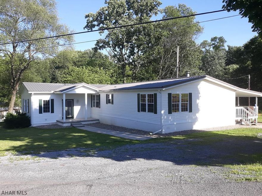 This home sits on almost a acre of ground and has 4 bedrooms, 2 baths, kitchen, living room with fireplace, dining room with bamboo flooring, large family room, community water, septic system, central air. All of this and more! Listed for $129,900 call for a showing today!