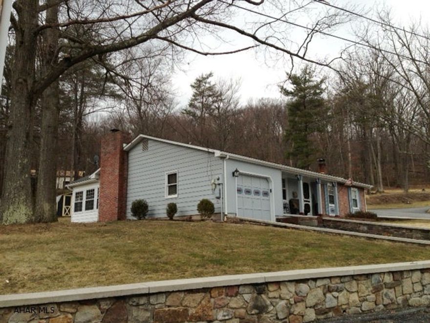 Beautifully decorated ranch home w/ a designer's touch. Gorgeous hardwood floors grace this open concept design. Surround yourself w/ natural light in the wonderful sunroom. The home commands excellent views. Master includes large closets and bathroom. Great finished recroom adds plenty of room for additional living space. Move in ready and perfect for people looking for one floor living.