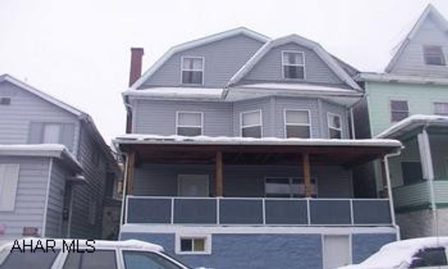 Nice big home-pocket doors, hardwood floors, original woodwork, thermal windows, finished attic.  Front and back porch. Off-street parking. Nice big home-pocket doors, hardwood floors, original woodwork, thermal windows, finished attic.  Front and back porch.  Off-street parking.