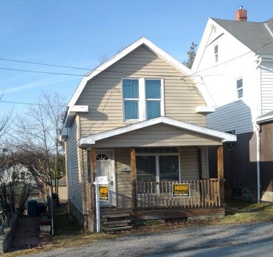 Totally refinished home with new furnace and central air. Vinyl siding. Rear deck. Covered front porch. Large lot. Off street parking. Fresh carpet & flooring throughout. Thermopane windows throughout.