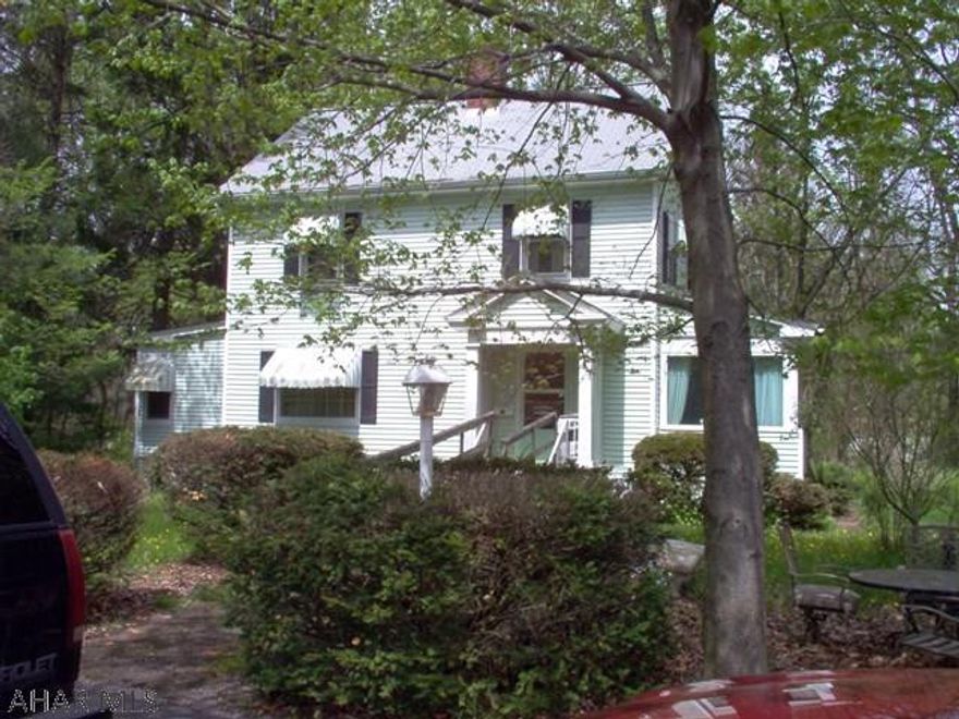 Secluded Wooded Setting, Ceramic Tile Kitchen and Bath, ten year roof, newer furnace (5 yr,) private drive-way, hardwood floors, brick fireplace.  Seller is PA Licensed Real Estate Agent currently in Escrow. TAXES ARE ESTIMATED