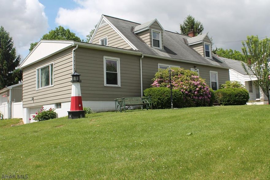 Roomy 4 bedroom ,1 and a half bath home located almost outside the borough of Martinsburg . House has some hard wood under the carpet. Enjoy the spacious fenced in  yard and LARGE 3 car garage 30 x40 x10 insulated with 200 amp service run to the garage and new service to the house,, Located about 20 mins to the lake .This home also boarders the park, close to the community pool,library, skating,and bowling.Close to many restaurants .Schedule your tour. MOTIVATED SELLER!!!